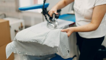 Dry cleaning clothes. Clean cloth chemical process. Laundry industrial dry-cleaning