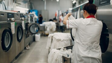 Dry cleaning clothes. Clean cloth chemical process. Laundry industrial dry-cleaning