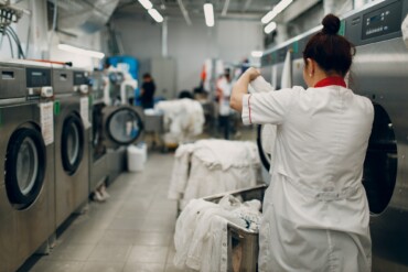 Dry cleaning clothes. Clean cloth chemical process. Laundry industrial dry-cleaning
