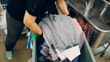 Dry cleaning clothes. Clean cloth chemical process. Laundry industrial dry-cleaning