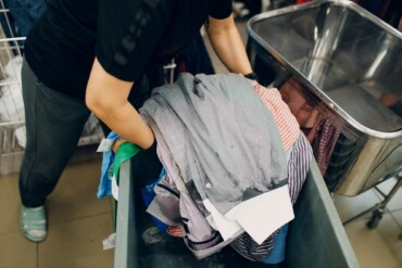Dry cleaning clothes. Clean cloth chemical process. Laundry industrial dry-cleaning
