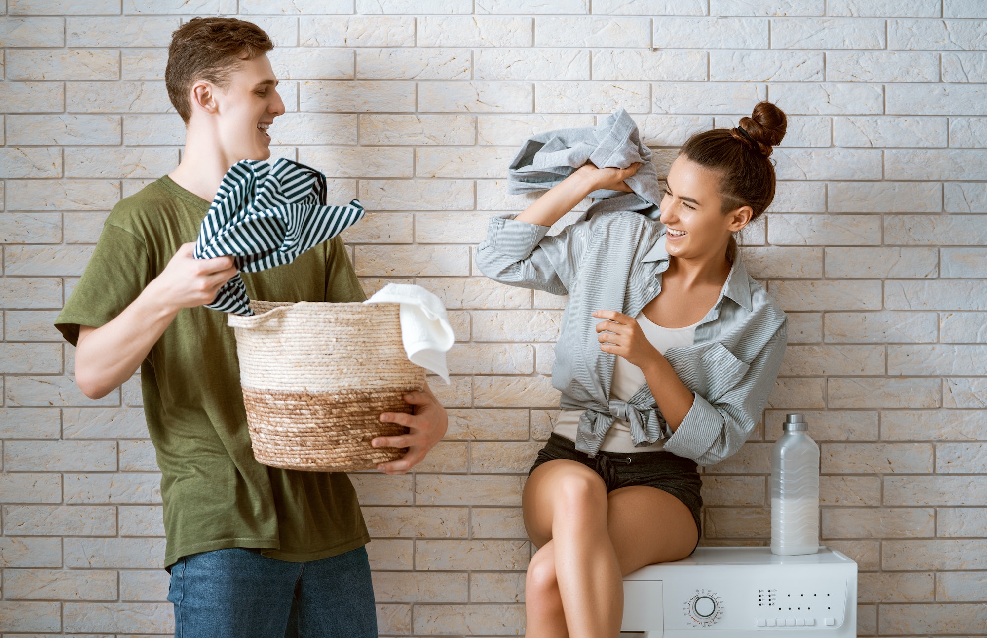 loving couple is doing laundry