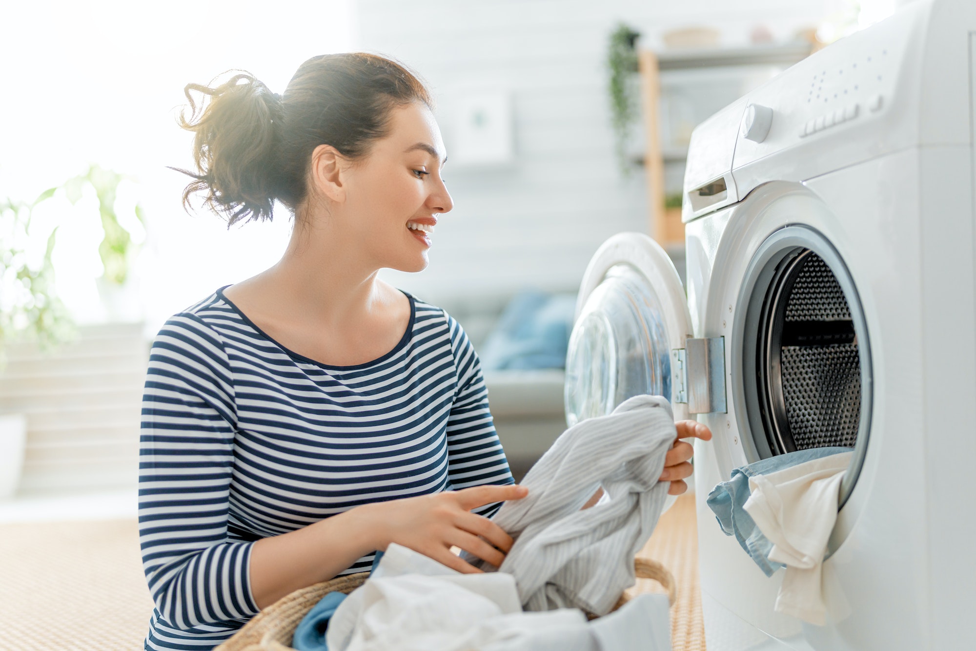 woman is doing laundry